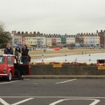 haha SO ENGLISH!! mini cooper, English coastal town. Amazing.